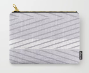 A change purse with gray and white lines