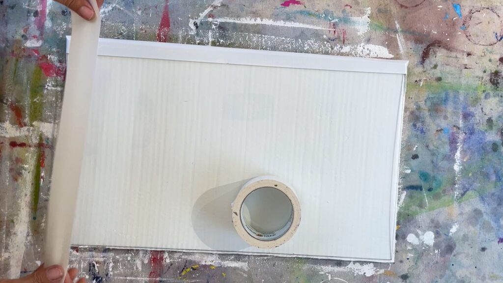 tape cardboard to glass with duct tape